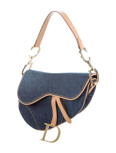 denim dior saddle bag.